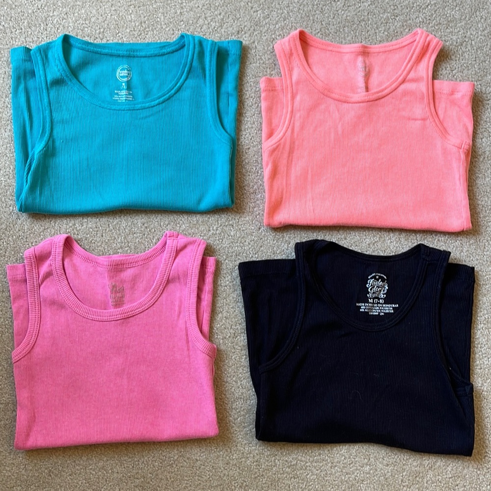 A bundle of 4 tank tops all size 7/8. Perfect for summer!